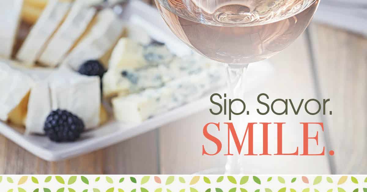 Sip, Savor, Smile event image with wine and cheese.
