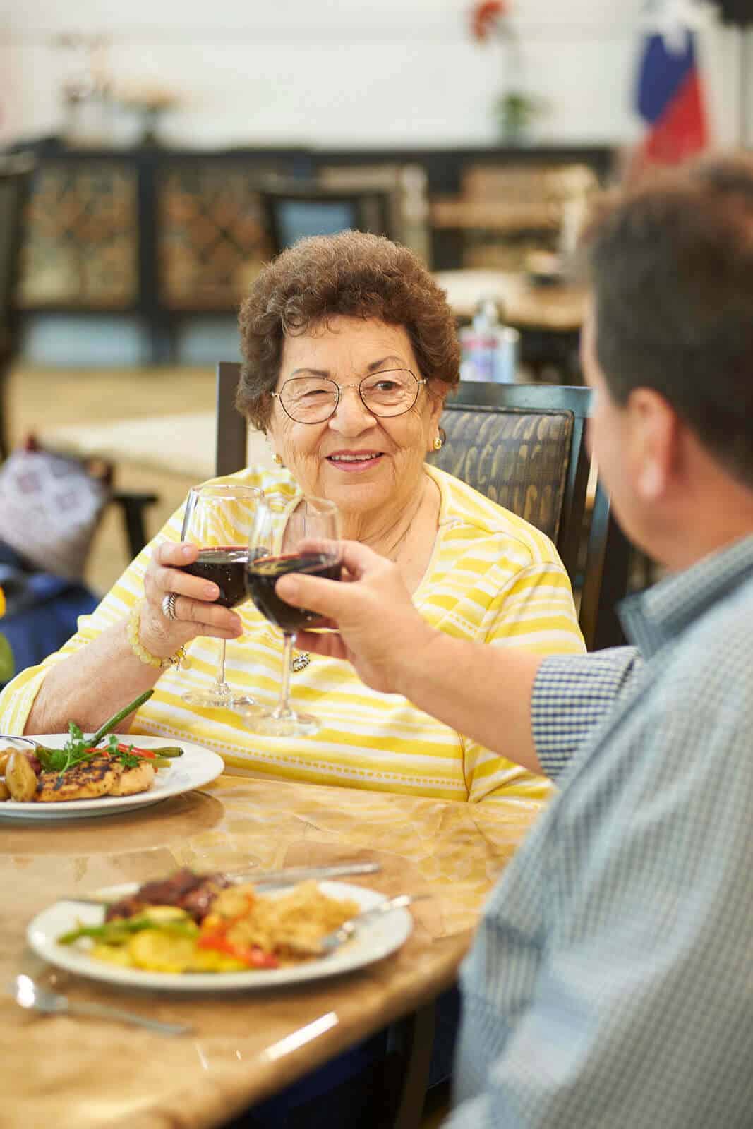 Residents enjoying food and wine
