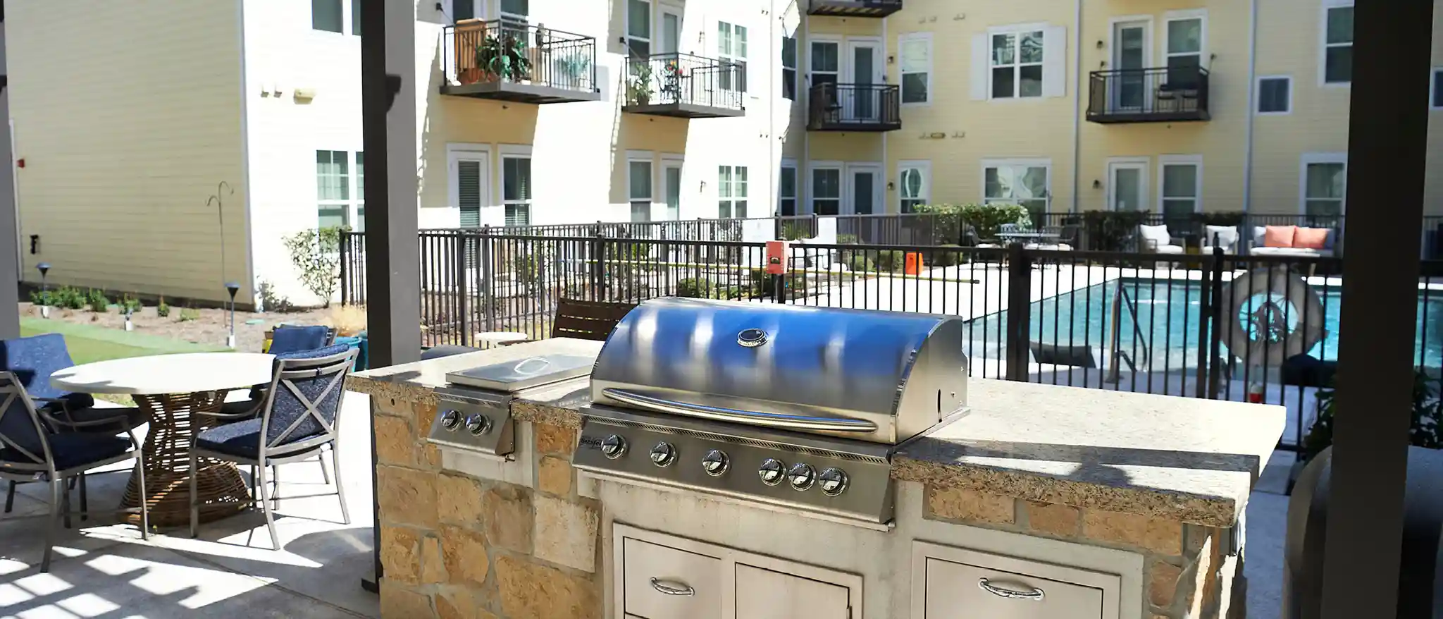 courtyard grill and pool at park creek